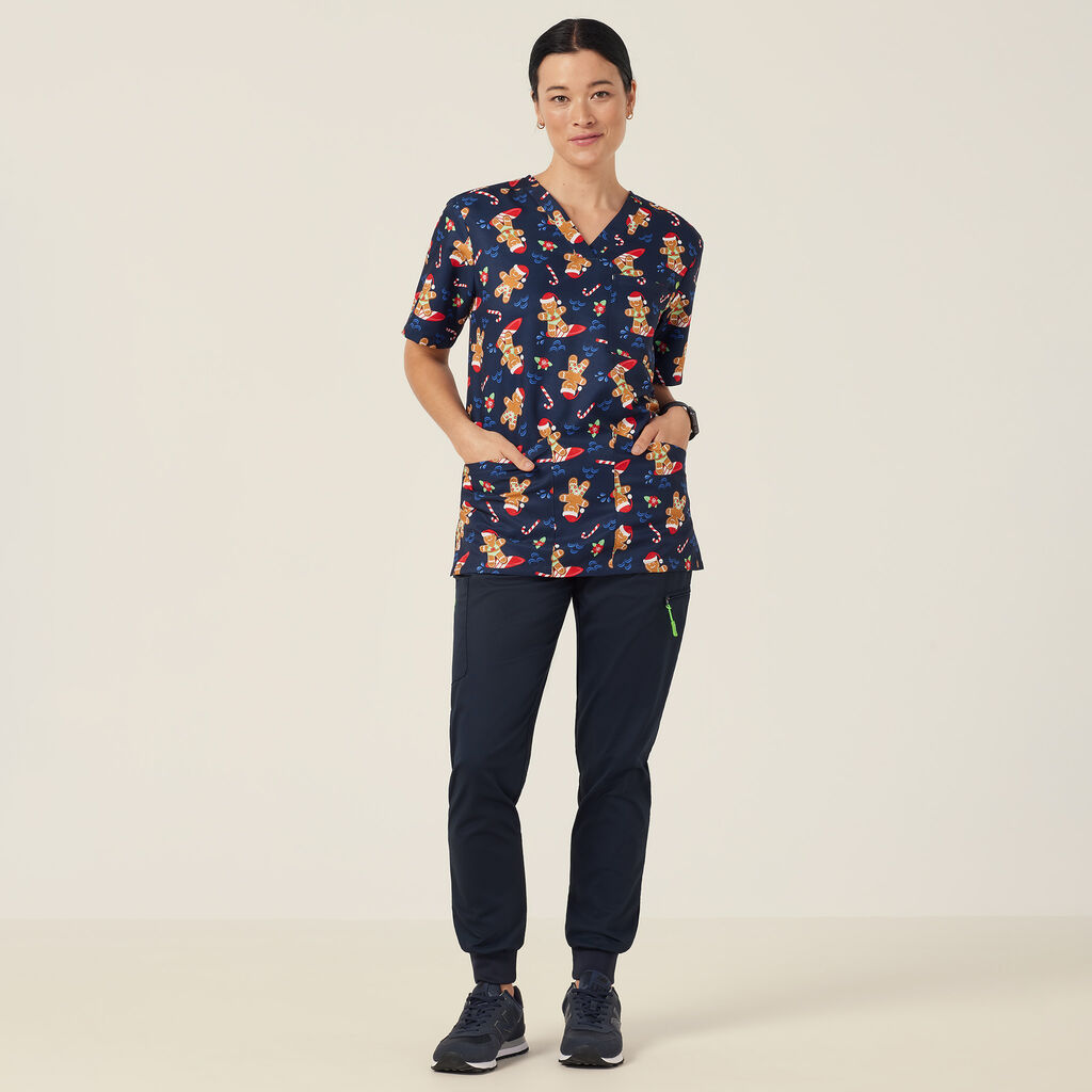 Festive Gingerbread Surfer Print Scrub Top